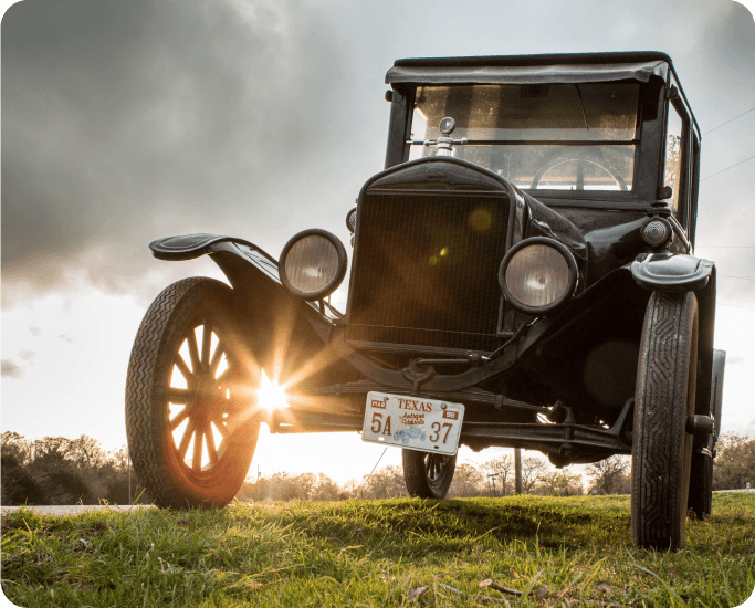 Image of vintage cars displayed at an automotive history location