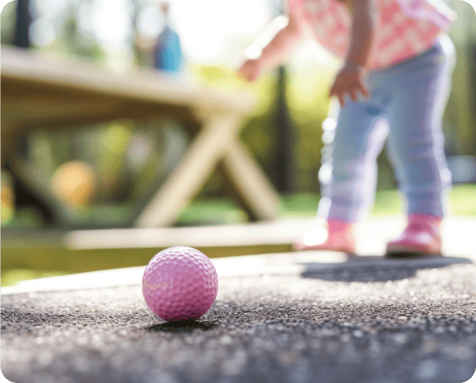 Image of a vibrant mini golf course at a Harvest Hosts location