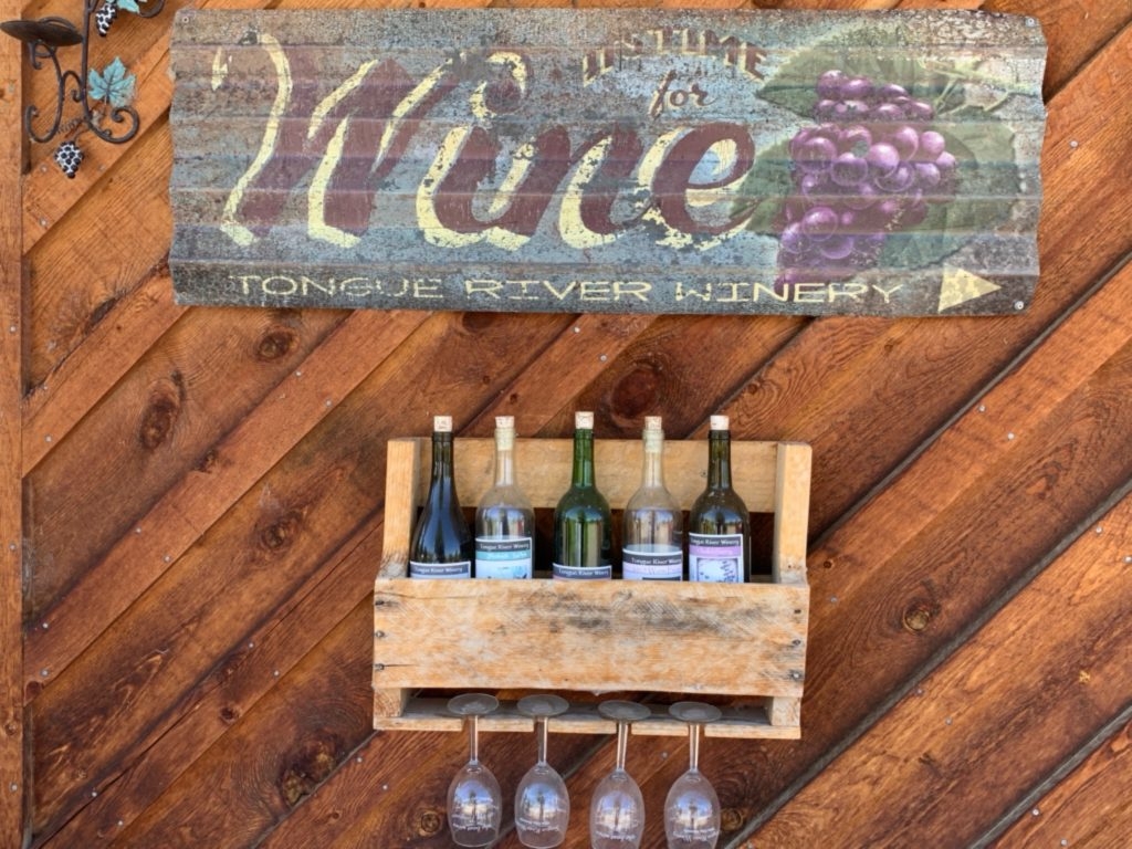 A winery sign leads the way to the Tongue River tasting room.