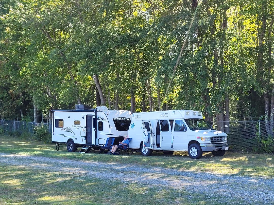 Travel Trailer KZ Escape Towed by Vintage Ambulance