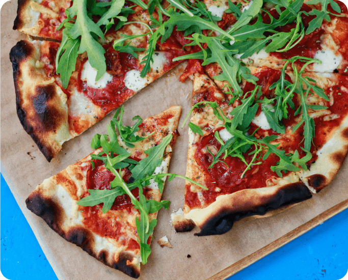 Image of a delicious pizza enjoyed at a Harvest Hosts location