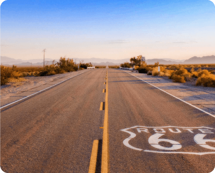 Image of iconic Route 66 signage along a beautiful scenic drive