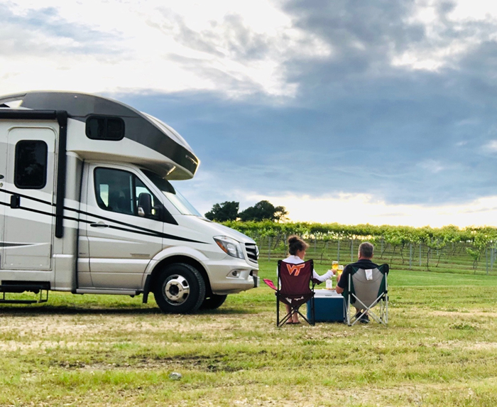 RV parked near a vineyard